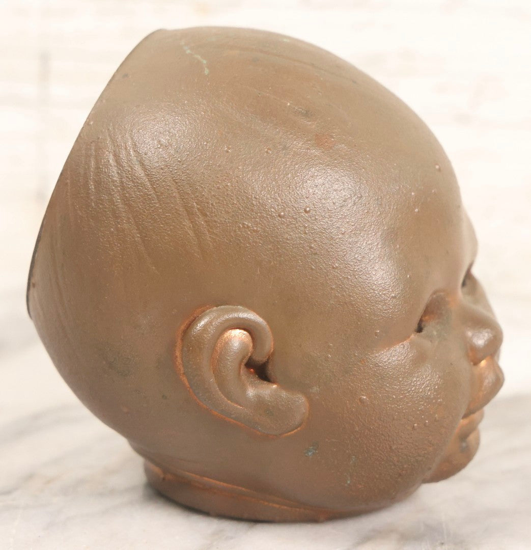Lot 047 - Vintage Cast Metal Doll Head Mold With Bronze Finish, Likely For Rubber Head Doll Production