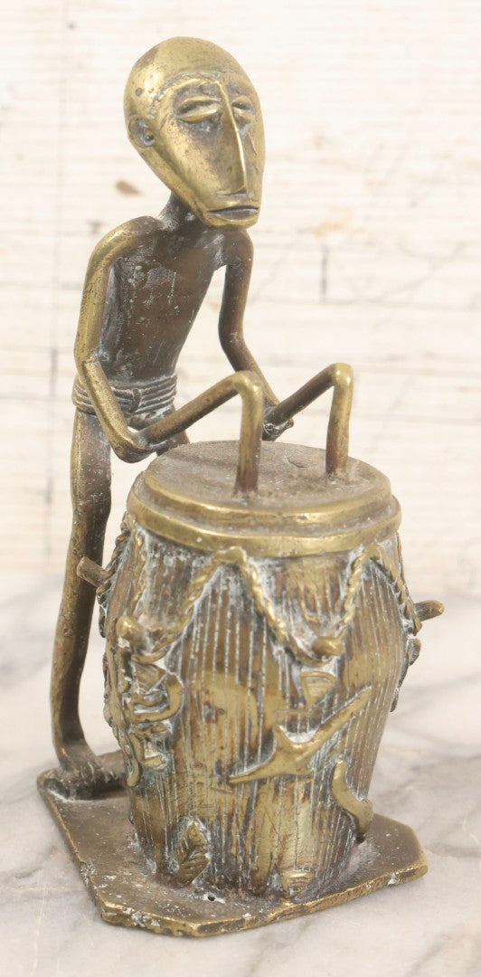 Lot 049 - Vintage Replica Cast Brass Figure Of Drummer Seated At Drum In West African Folk Art Style, 7" H
