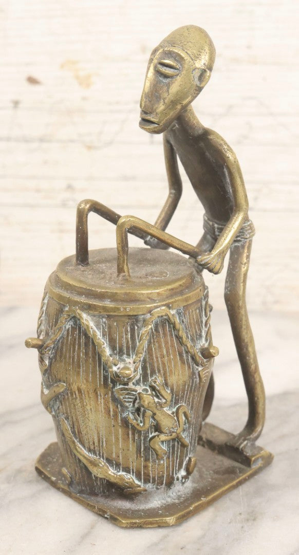 Lot 049 - Vintage Replica Cast Brass Figure Of Drummer Seated At Drum In West African Folk Art Style, 7" H