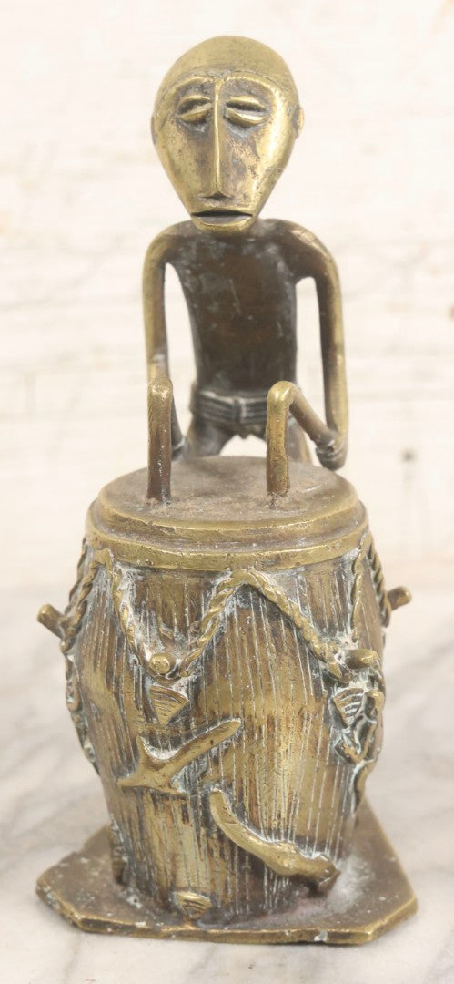 Lot 049 - Vintage Replica Cast Brass Figure Of Drummer Seated At Drum In West African Folk Art Style, 7" H