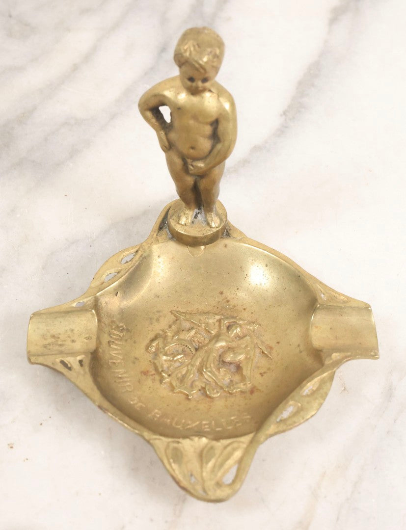 Lot 050 - Pair Of Vintage Cast Bronze "Souvenir De Bruxelles" Boy Ashtrays With Winged Herald And Dragon Motif, 3-5/8" H Each