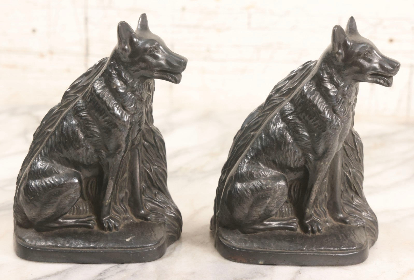 Lot 051 - Vintage Pair Of Cast Pot Metal Wolf Bookends With Foliage Background And Silver Finish, 6-5/8" H Each
