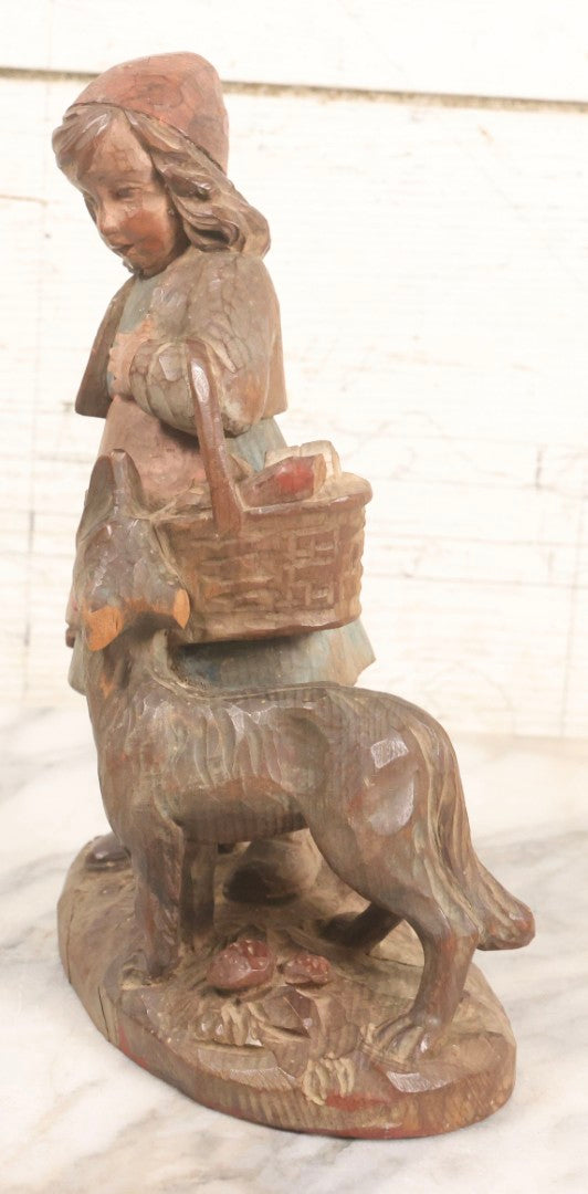 Lot 052 - Vintage Hand Carved Folk Art Wooden Statue Of Girl With Basket Of Groceries And Begging Dog, Hand Painted, 9-3/4" H