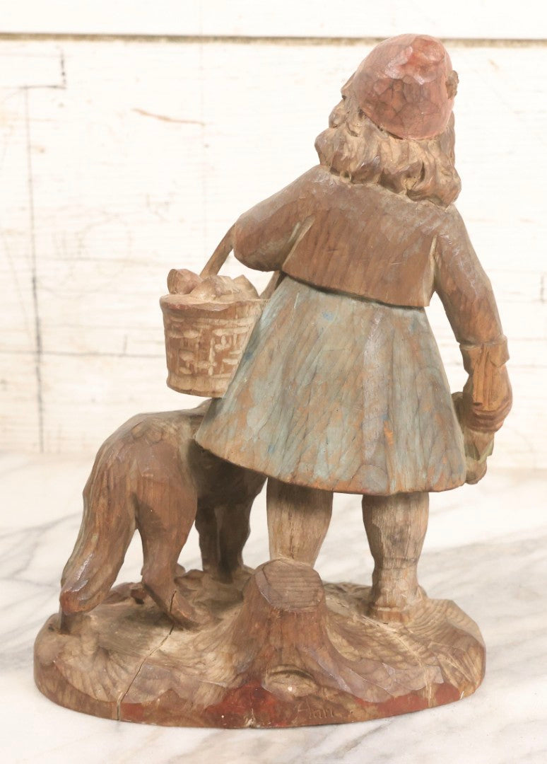 Lot 052 - Vintage Hand Carved Folk Art Wooden Statue Of Girl With Basket Of Groceries And Begging Dog, Hand Painted, 9-3/4" H