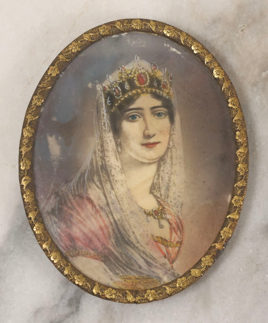 Lot 058 - Antique Hand-Colored Lithograph Portrait Of Empress Josephine Of France In Pressed Brass Oval Bubble Frame, 2-7/8" x 3-1/2"