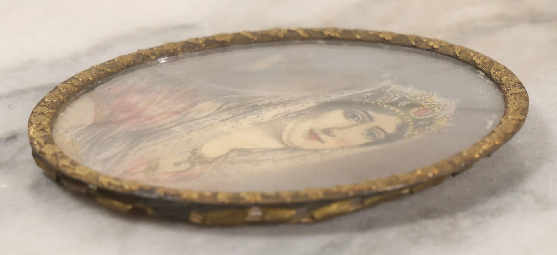 Lot 058 - Antique Hand-Colored Lithograph Portrait Of Empress Josephine Of France In Pressed Brass Oval Bubble Frame, 2-7/8" x 3-1/2"