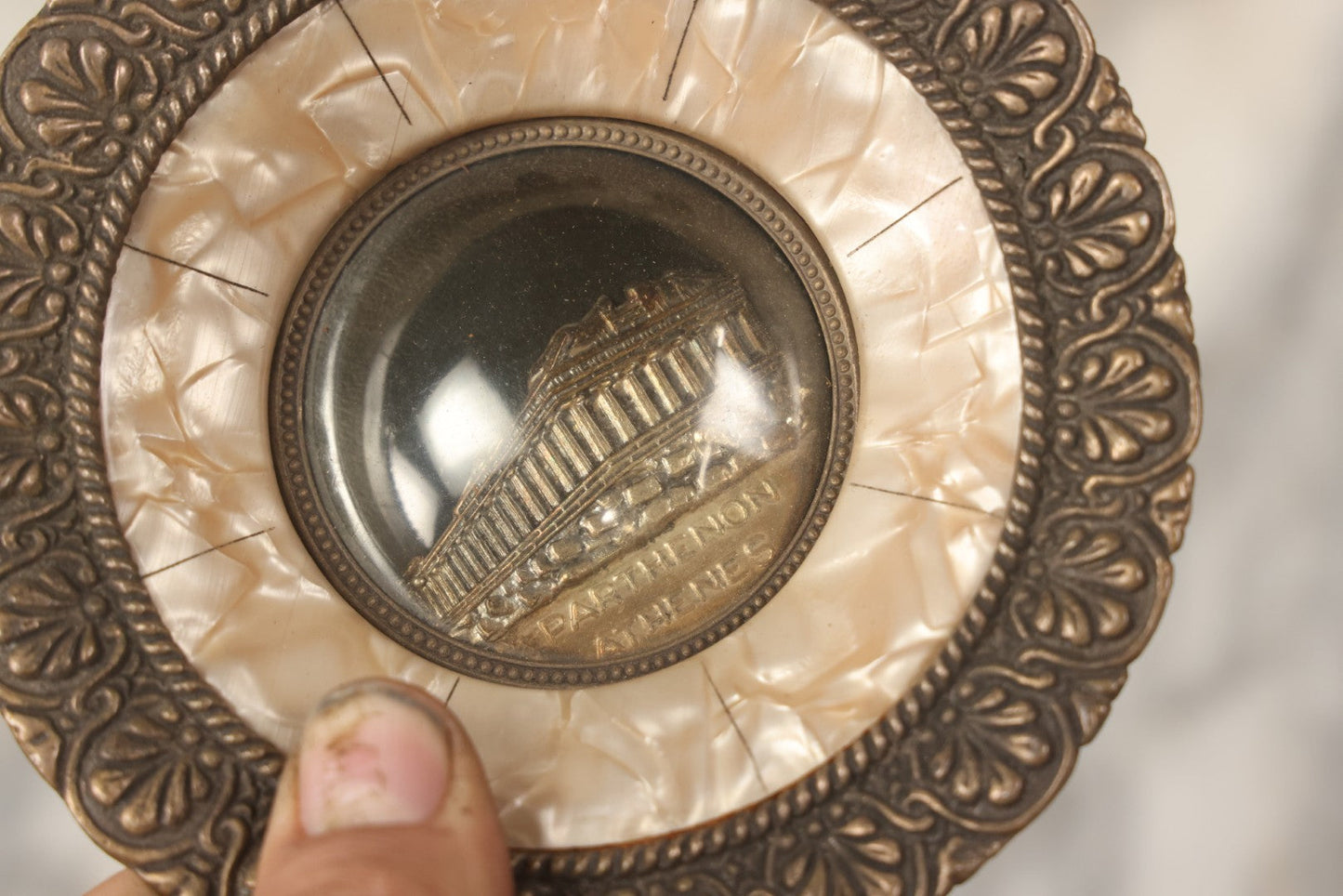 Lot 060 - Pair Of Vintage Greek Travel Souvenirs From Ioannina And The Parthenon, Athens, With Metal Architectural Reliefs Under Plastic Domes And Mother Of Pearl Surrounds, 5-1/4" Diameter Each