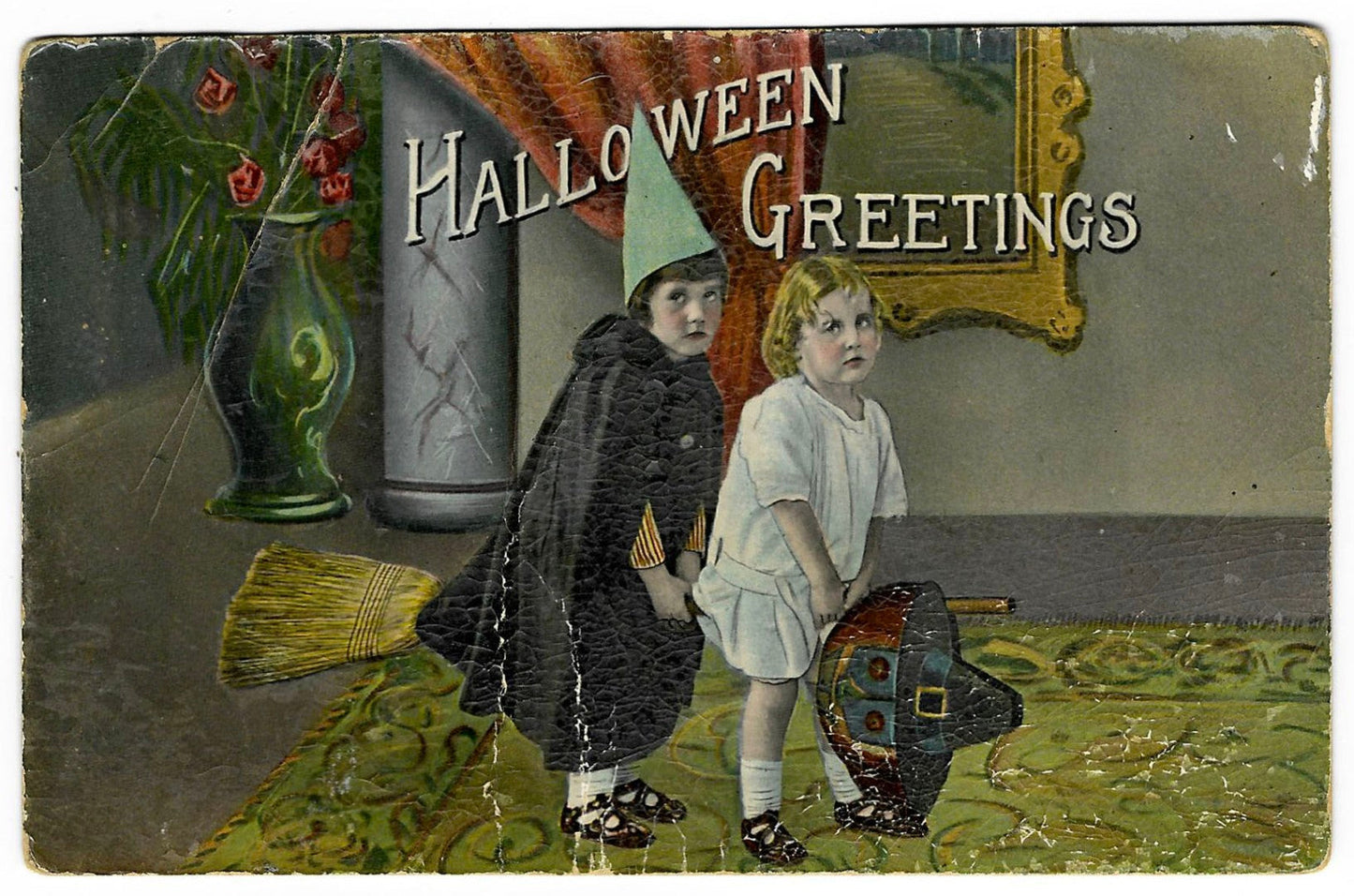 Lot 070 - Antique Halloween Postcard “Halloween Greetings” Depicting Two Children In Costumes With Broom And Jack-O-Lantern Mask, Series 1312, Postmarked West Virginia, 1918, Written On Verso