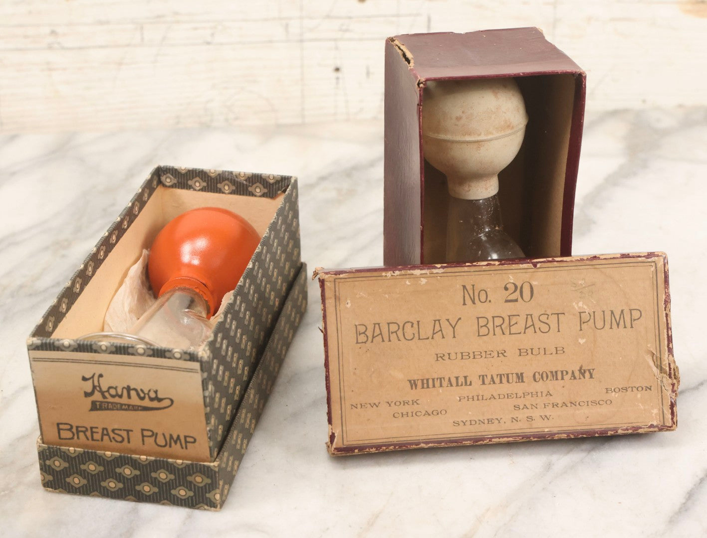 Lot 074 - Pair Of Antique Glass And Rubber Breast Pumps In Original Boxes — Barclay No. 20 By Whitall Tatum Co., New York, And Harva Trademark