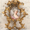 Lot 076 - Antique Hand Painted Porcelain Tile Of White-Haired Woman In Pink Dress In Ornate Ormolu Frame, A.M.W., 24Kt Gold Plate, Note Frame Damage, Repairs, 4-3/4" x 5-3/4"