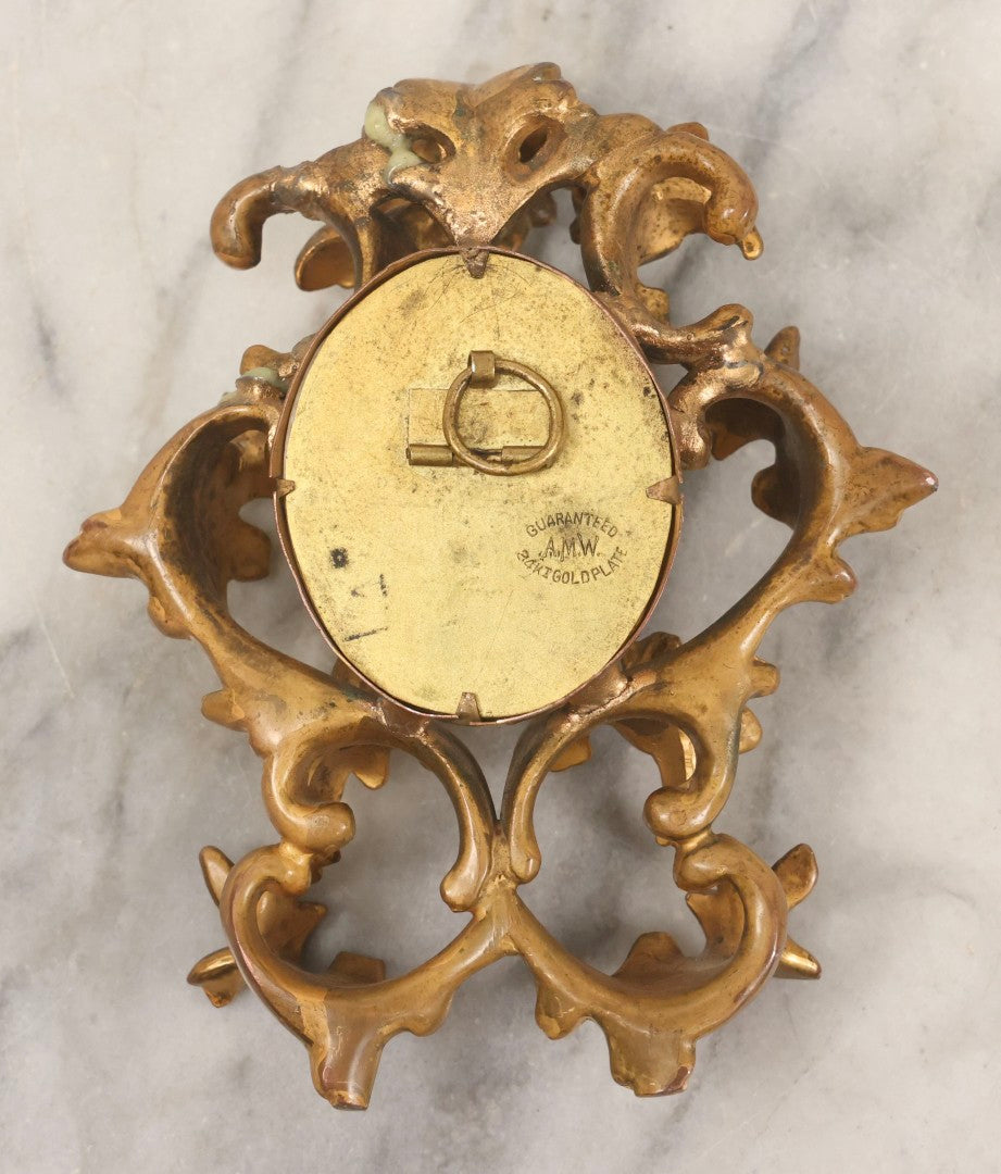 Lot 076 - Antique Hand Painted Porcelain Tile Of White-Haired Woman In Pink Dress In Ornate Ormolu Frame, A.M.W., 24Kt Gold Plate, Note Frame Damage, Repairs, 4-3/4" x 5-3/4"