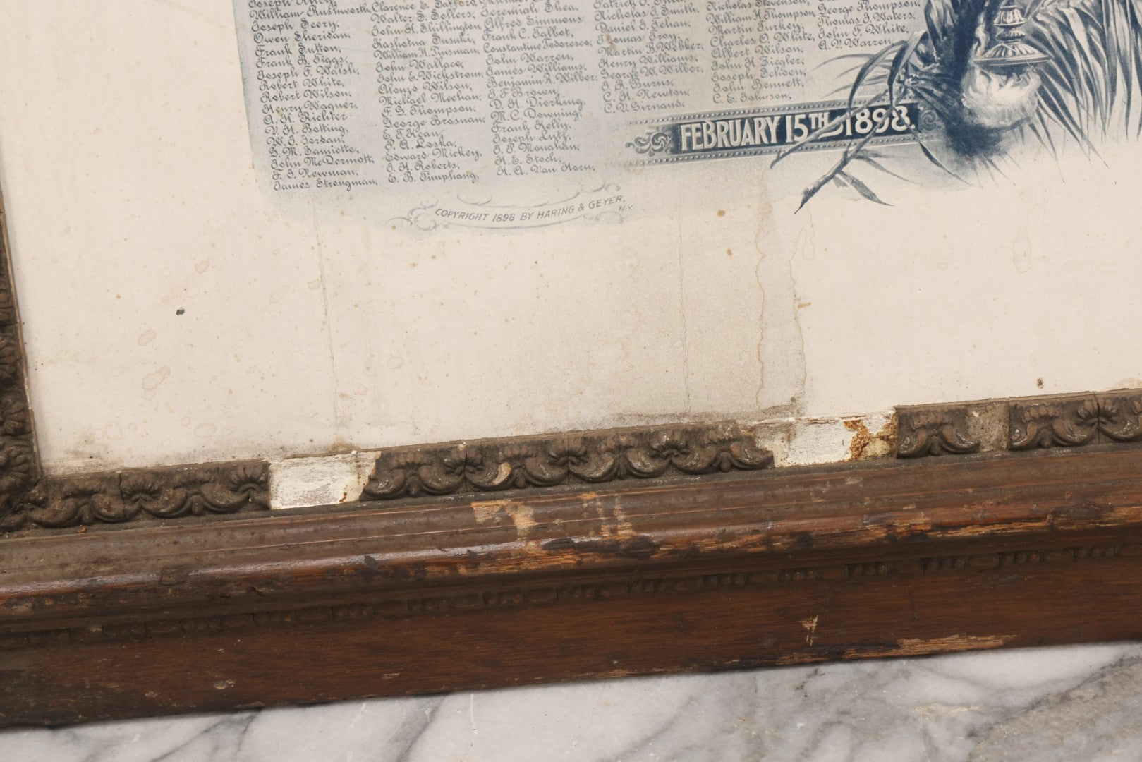 Lot 078 - Antique Commemorative Mourning Print "In Memoriam" Of The Sinking Of The Maine, February 15, 1898, With Original Frame, List Of Deceased, Note No Glass, Poor Condition, 17-7/8" x 21-7/8"