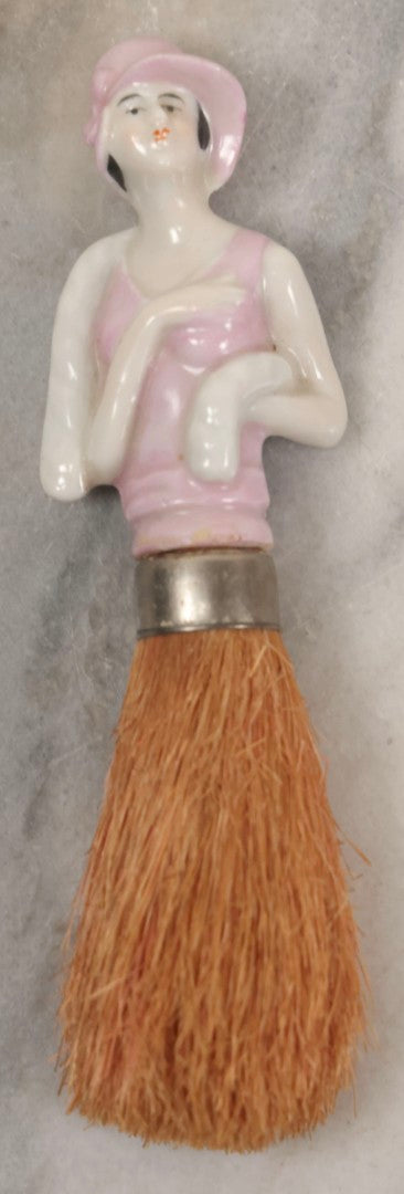 Lot 081 - Pair Of Vintage Porcelain Dresser Brushes With Straw Bristles, German Made, Featuring Woman In White Dress And Flapper Girl With Fur Boa