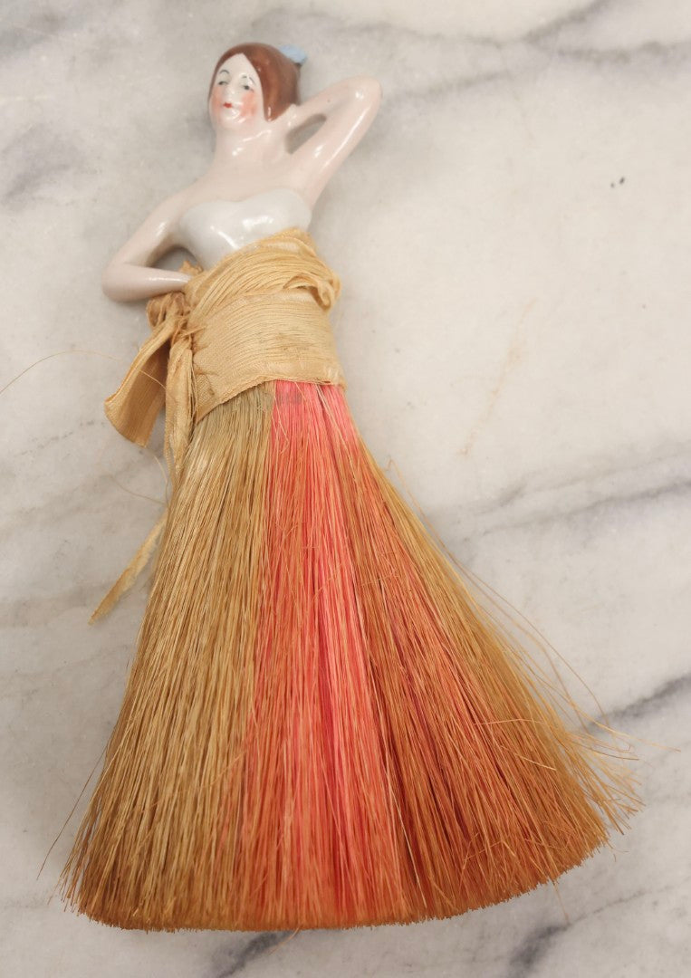 Lot 081 - Pair Of Vintage Porcelain Dresser Brushes With Straw Bristles, German Made, Featuring Woman In White Dress And Flapper Girl With Fur Boa