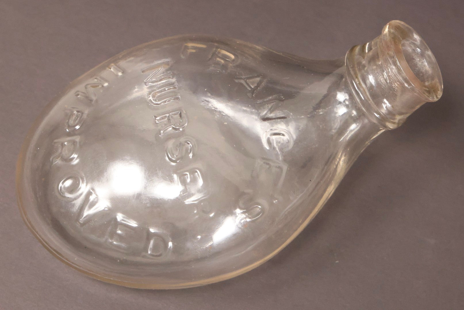 Lot 087 - Antique France's Improved Nurser Clear Glass Nursing Bottle, So-Called "Murder Bottle"