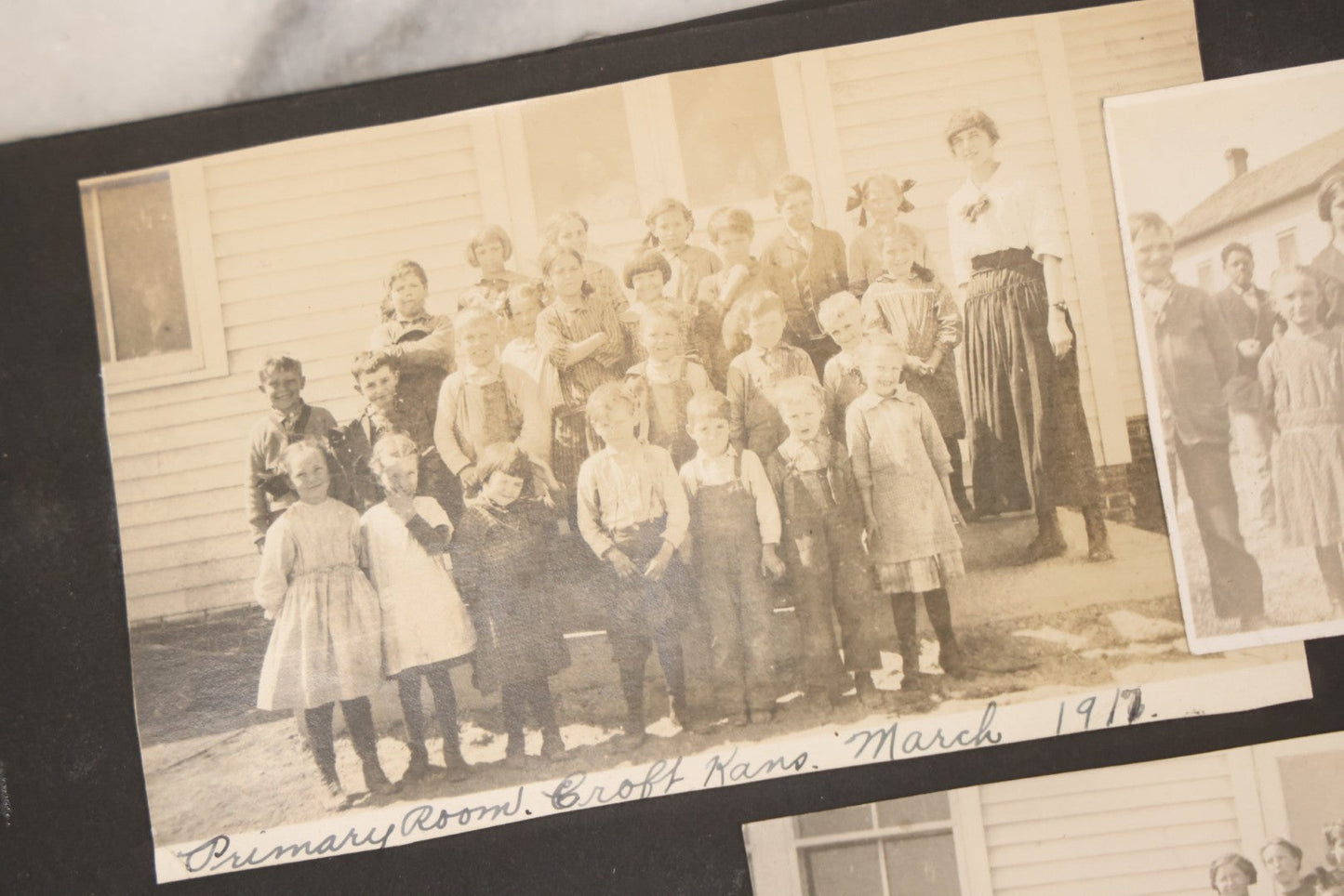 Lot 097 - Antique Snapshot Photograph Album With 225+ Photos Of Rural Life In Kansas, Including Adventuring Teenage Girls, Croft Schoolchildren, Wwi Soldiers, And Burning Of Croft Depot, Circa 1910–1920