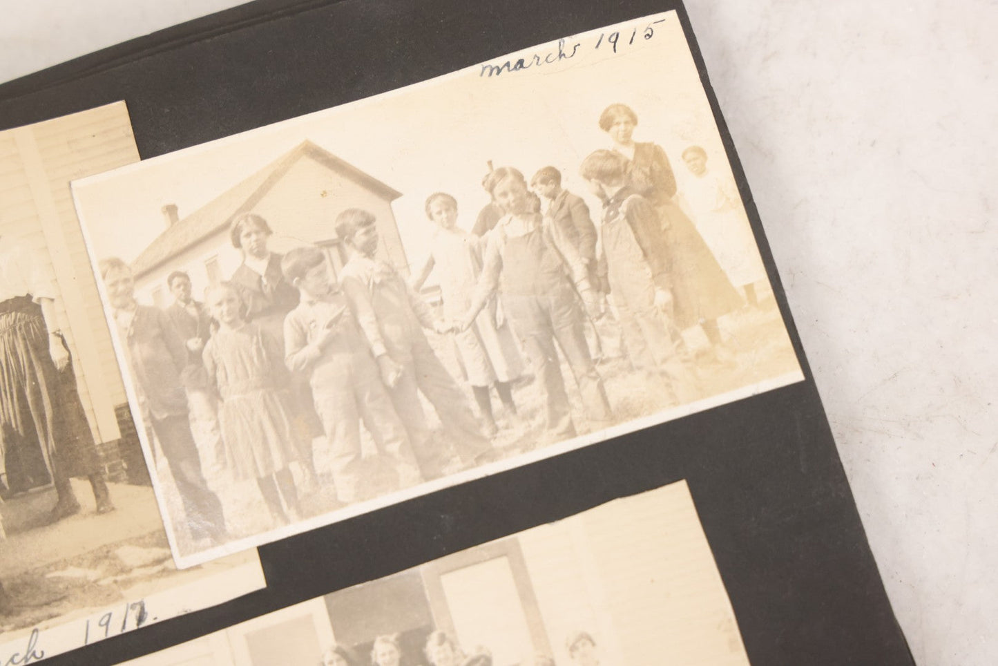 Lot 097 - Antique Snapshot Photograph Album With 225+ Photos Of Rural Life In Kansas, Including Adventuring Teenage Girls, Croft Schoolchildren, Wwi Soldiers, And Burning Of Croft Depot, Circa 1910–1920
