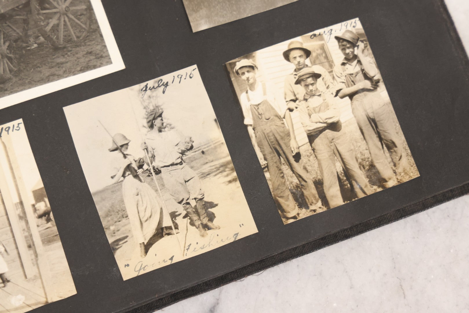 Lot 097 - Antique Snapshot Photograph Album With 225+ Photos Of Rural Life In Kansas, Including Adventuring Teenage Girls, Croft Schoolchildren, Wwi Soldiers, And Burning Of Croft Depot, Circa 1910–1920