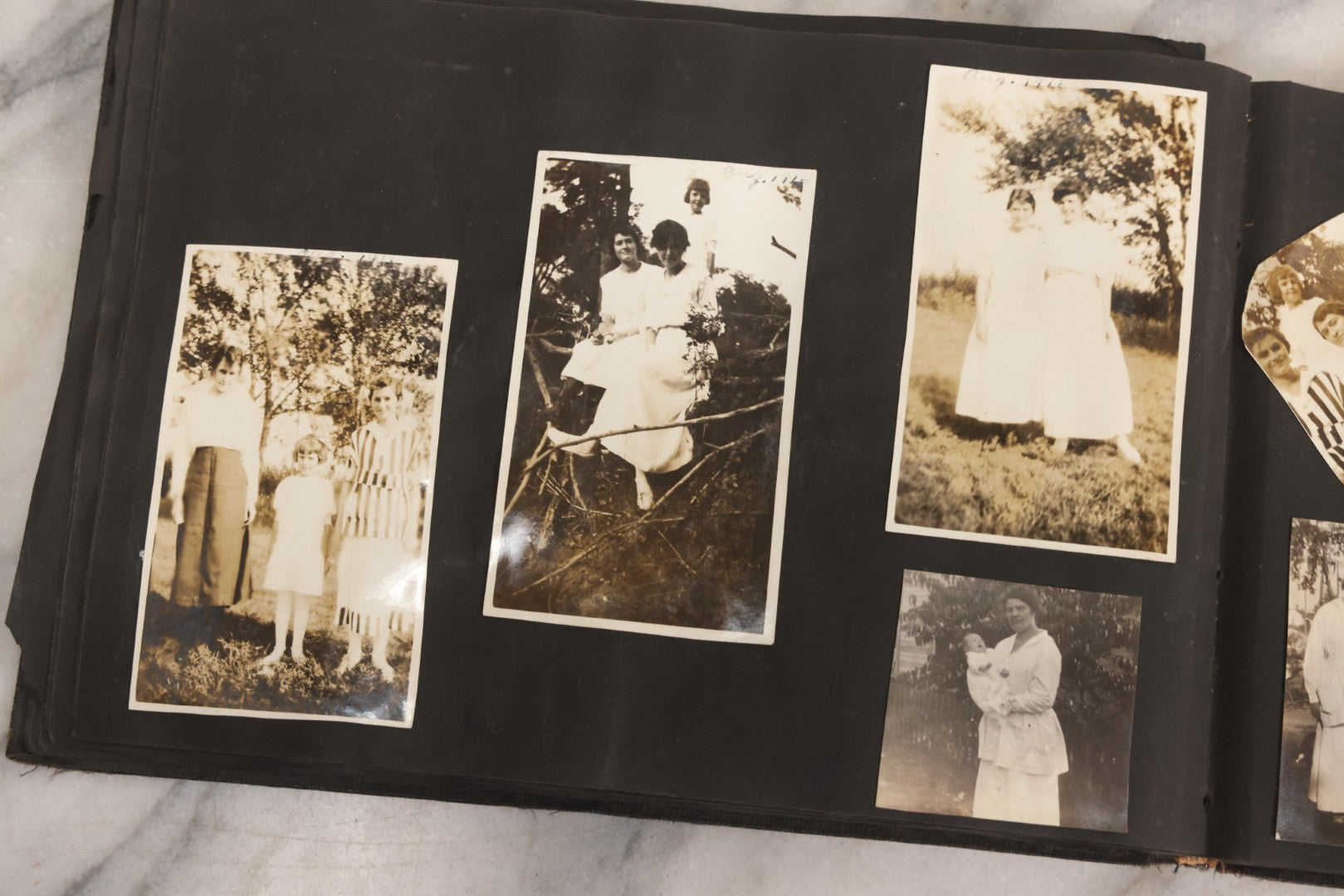 Lot 097 - Antique Snapshot Photograph Album With 225+ Photos Of Rural Life In Kansas, Including Adventuring Teenage Girls, Croft Schoolchildren, Wwi Soldiers, And Burning Of Croft Depot, Circa 1910–1920