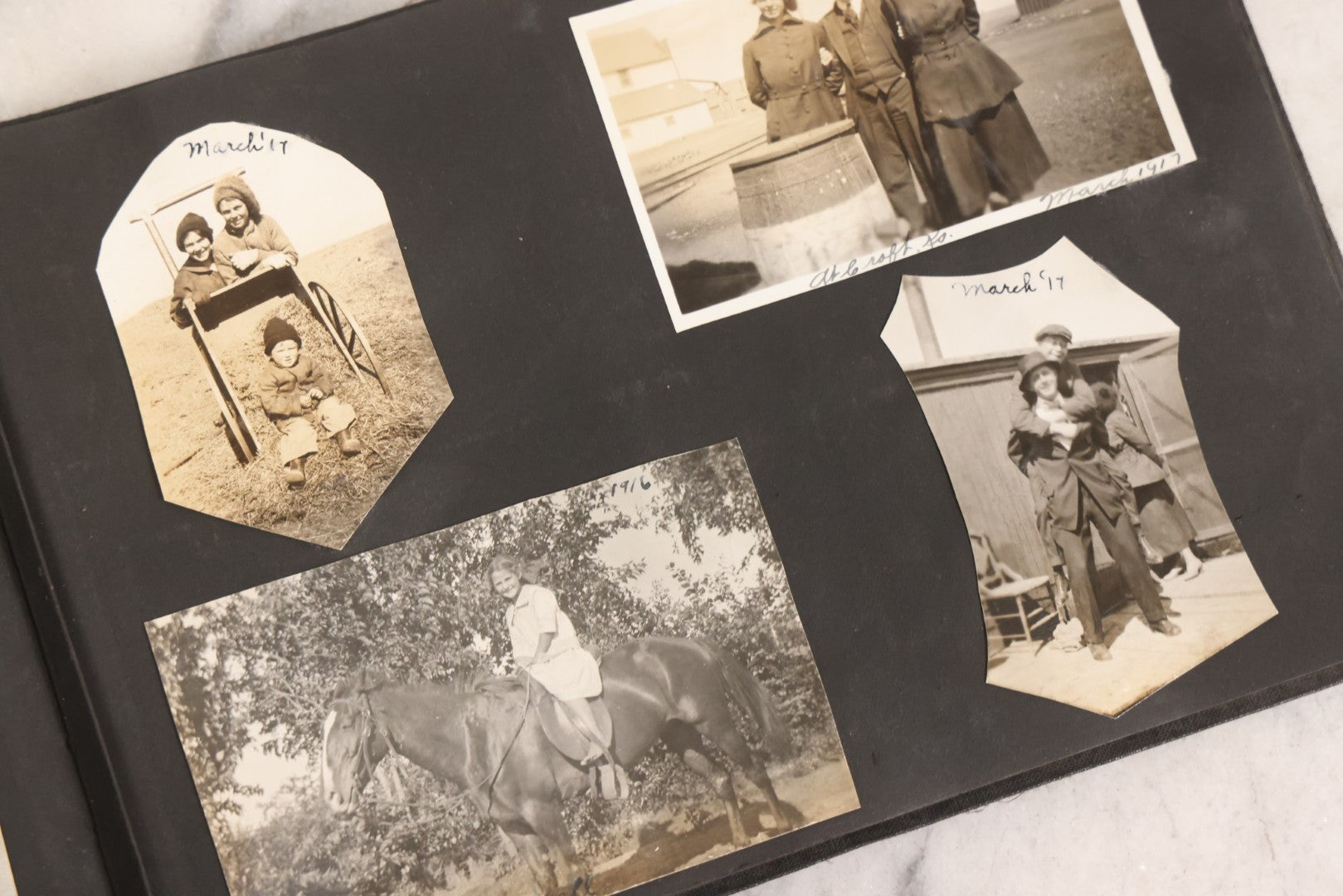 Lot 097 - Antique Snapshot Photograph Album With 225+ Photos Of Rural Life In Kansas, Including Adventuring Teenage Girls, Croft Schoolchildren, Wwi Soldiers, And Burning Of Croft Depot, Circa 1910–1920