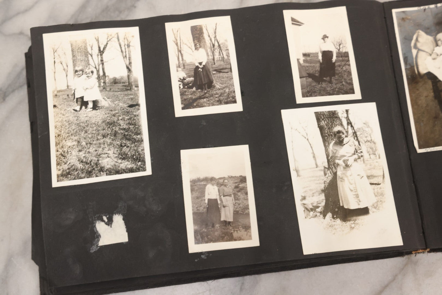 Lot 097 - Antique Snapshot Photograph Album With 225+ Photos Of Rural Life In Kansas, Including Adventuring Teenage Girls, Croft Schoolchildren, Wwi Soldiers, And Burning Of Croft Depot, Circa 1910–1920