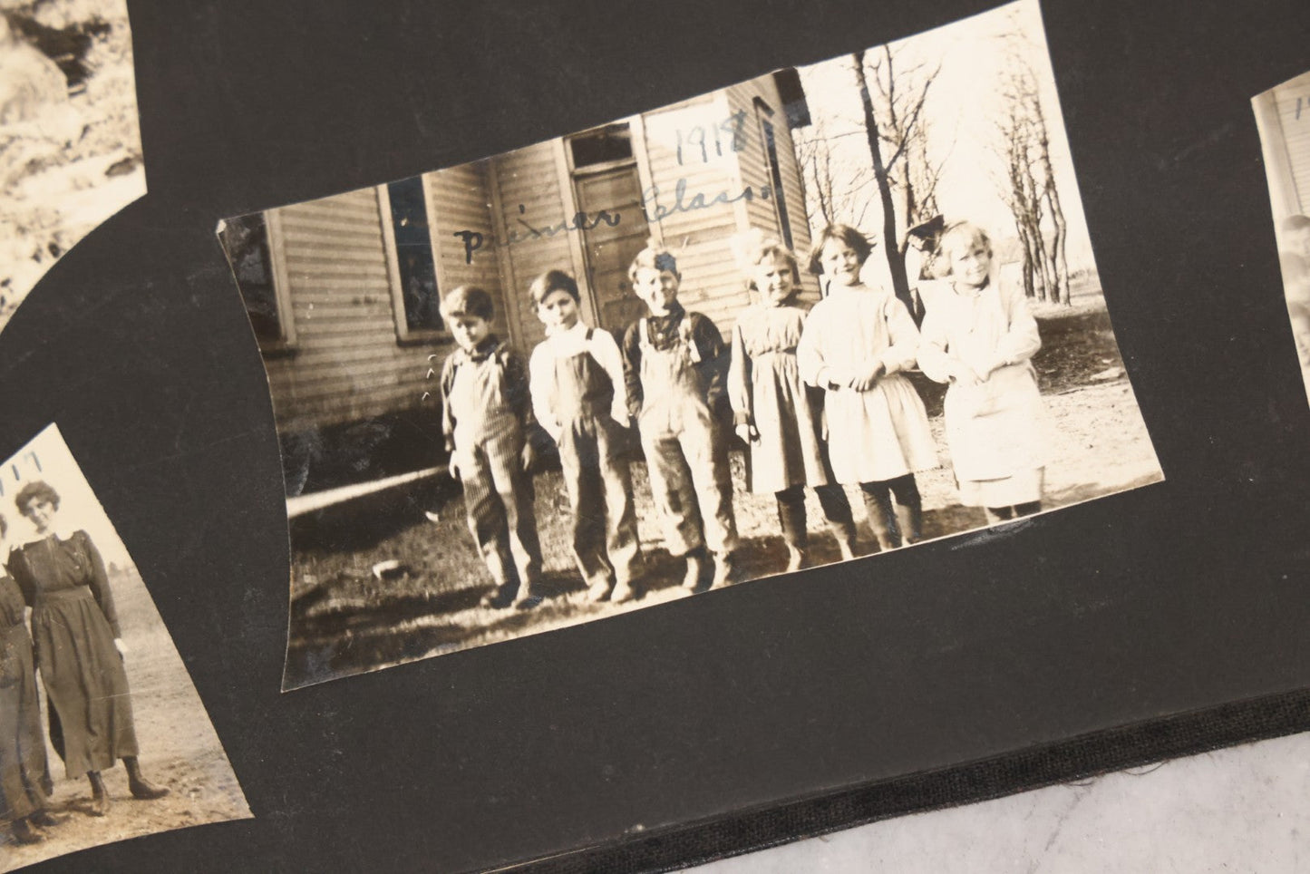 Lot 097 - Antique Snapshot Photograph Album With 225+ Photos Of Rural Life In Kansas, Including Adventuring Teenage Girls, Croft Schoolchildren, Wwi Soldiers, And Burning Of Croft Depot, Circa 1910–1920