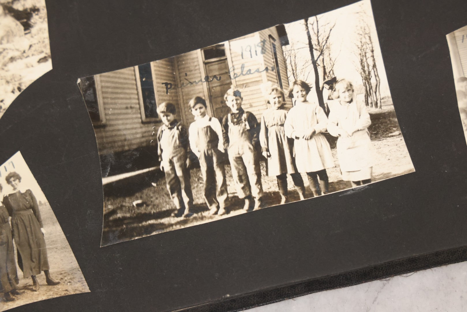 Lot 097 - Antique Snapshot Photograph Album With 225+ Photos Of Rural Life In Kansas, Including Adventuring Teenage Girls, Croft Schoolchildren, Wwi Soldiers, And Burning Of Croft Depot, Circa 1910–1920