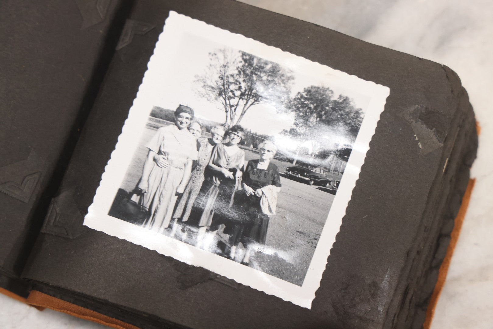 Lot 098 - Antique Snapshot Photograph Album With Leather Souvenir Cover From St. Petersburg, Florida, Containing 75+ Family Photos From New Hampshire And Vermont, Including World War One Soldier, Circa 1920s–1930s