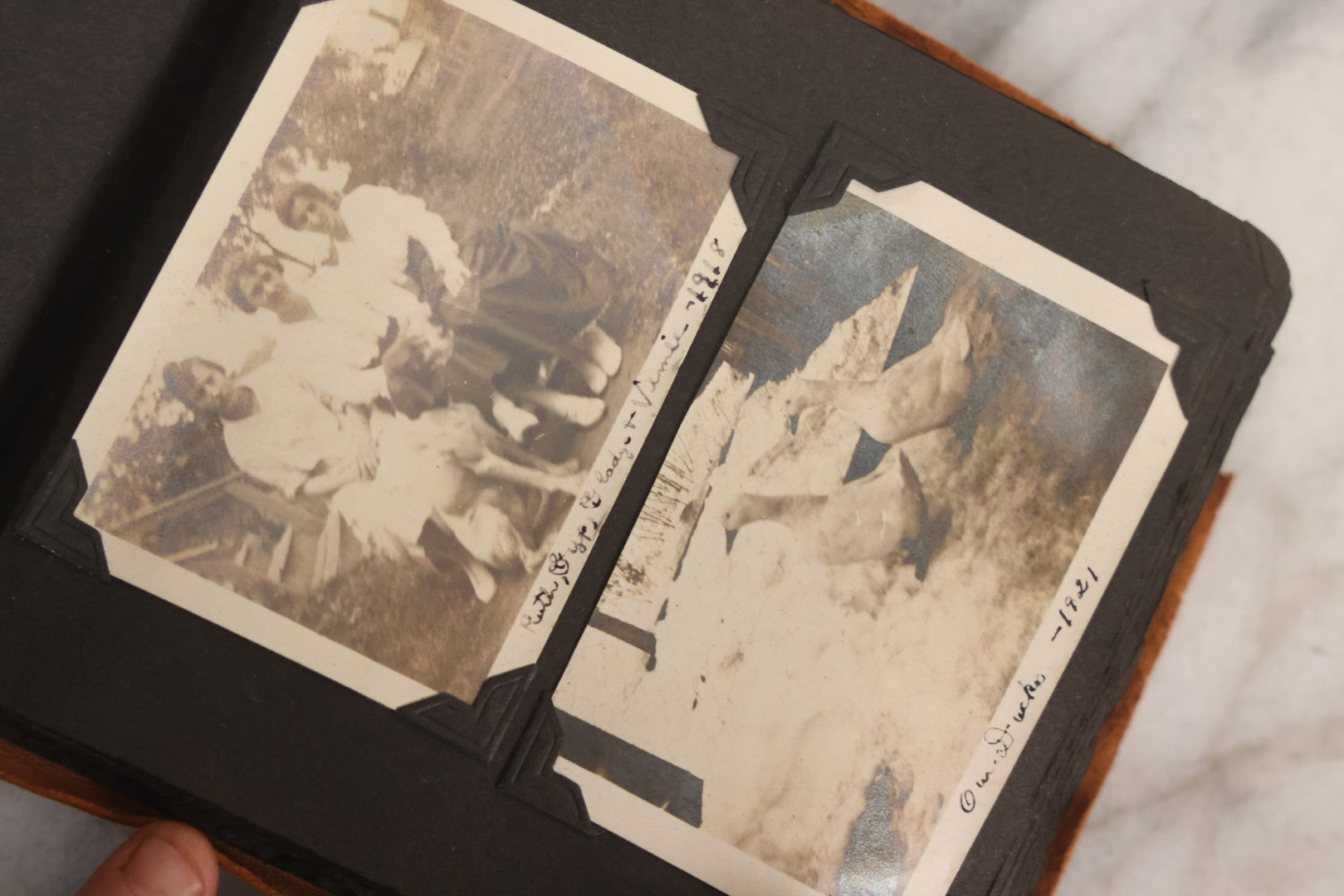 Lot 098 - Antique Snapshot Photograph Album With Leather Souvenir Cover From St. Petersburg, Florida, Containing 75+ Family Photos From New Hampshire And Vermont, Including World War One Soldier, Circa 1920s–1930s