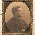 Lot 103 - Antique Oval Black And White Photograph Of Priest In Vestments With Pectoral Crucifix, Circa 1920s In Gilded Moulded Gesso Frame, 13" x 15-3/8"