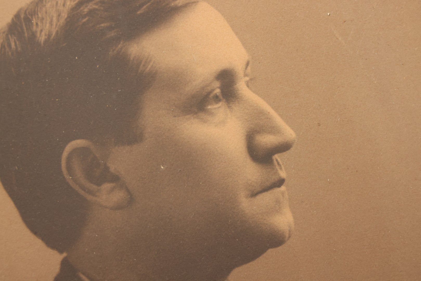 Lot 103 - Antique Oval Black And White Photograph Of Priest In Vestments With Pectoral Crucifix, Circa 1920s In Gilded Moulded Gesso Frame, 13" x 15-3/8"