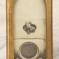 Lot 106 - Antique Framed Photograph Of Woman In Early Automobile With Spare Tire Visible, In Gold Painted Metal Pointed Arch Frame, 2-1/2" x 5"