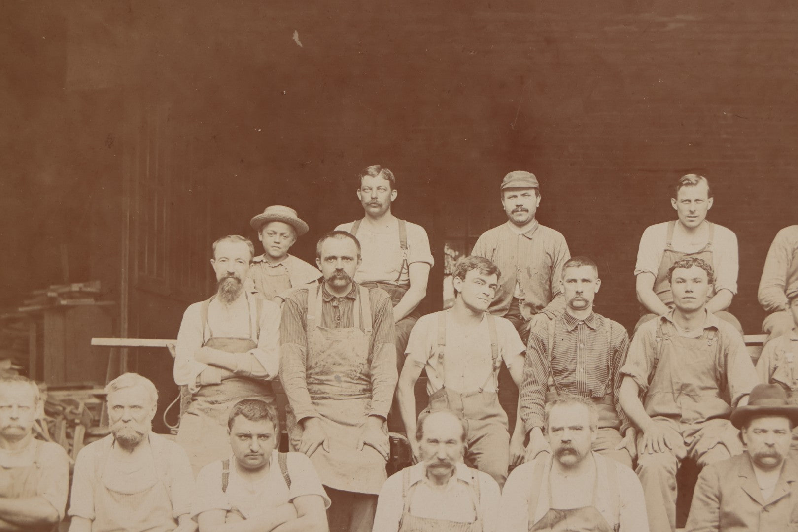 Lot 109 - Antique Boarded Occupational Photograph Of Lumberyard Workers In Work Clothes Posed Atop Stacked Lumber On Sawhorses Before Piles Of Wood