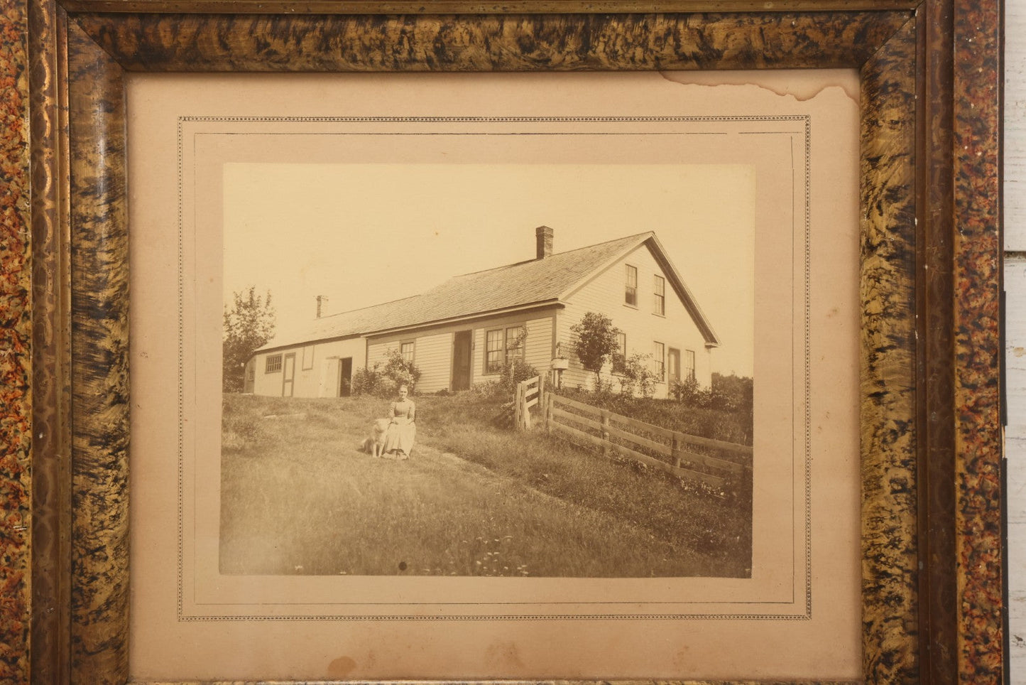 Lot 110 - Antique Boarded Photograph Of Woman Seated With Dog Before Farmhouse And Barn, In Faux Marble Painted Double Frame, 15-5/8" x 13-3/4"