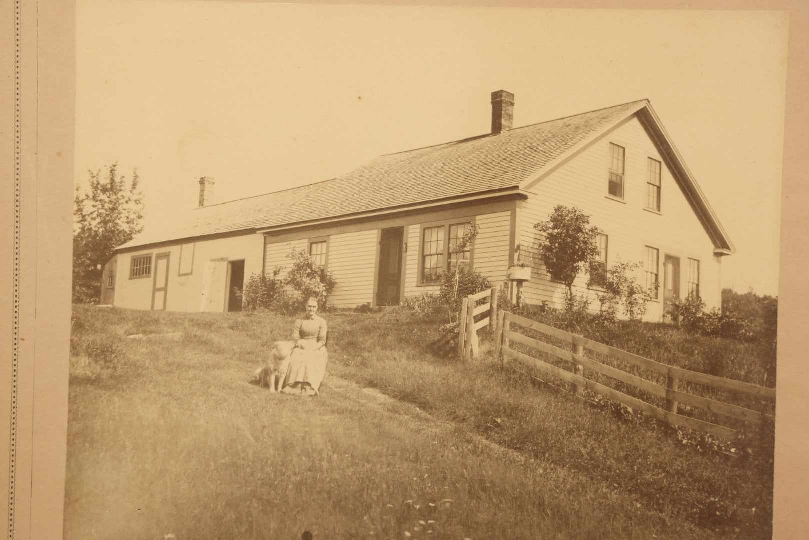 Lot 110 - Antique Boarded Photograph Of Woman Seated With Dog Before Farmhouse And Barn, In Faux Marble Painted Double Frame, 15-5/8" x 13-3/4"