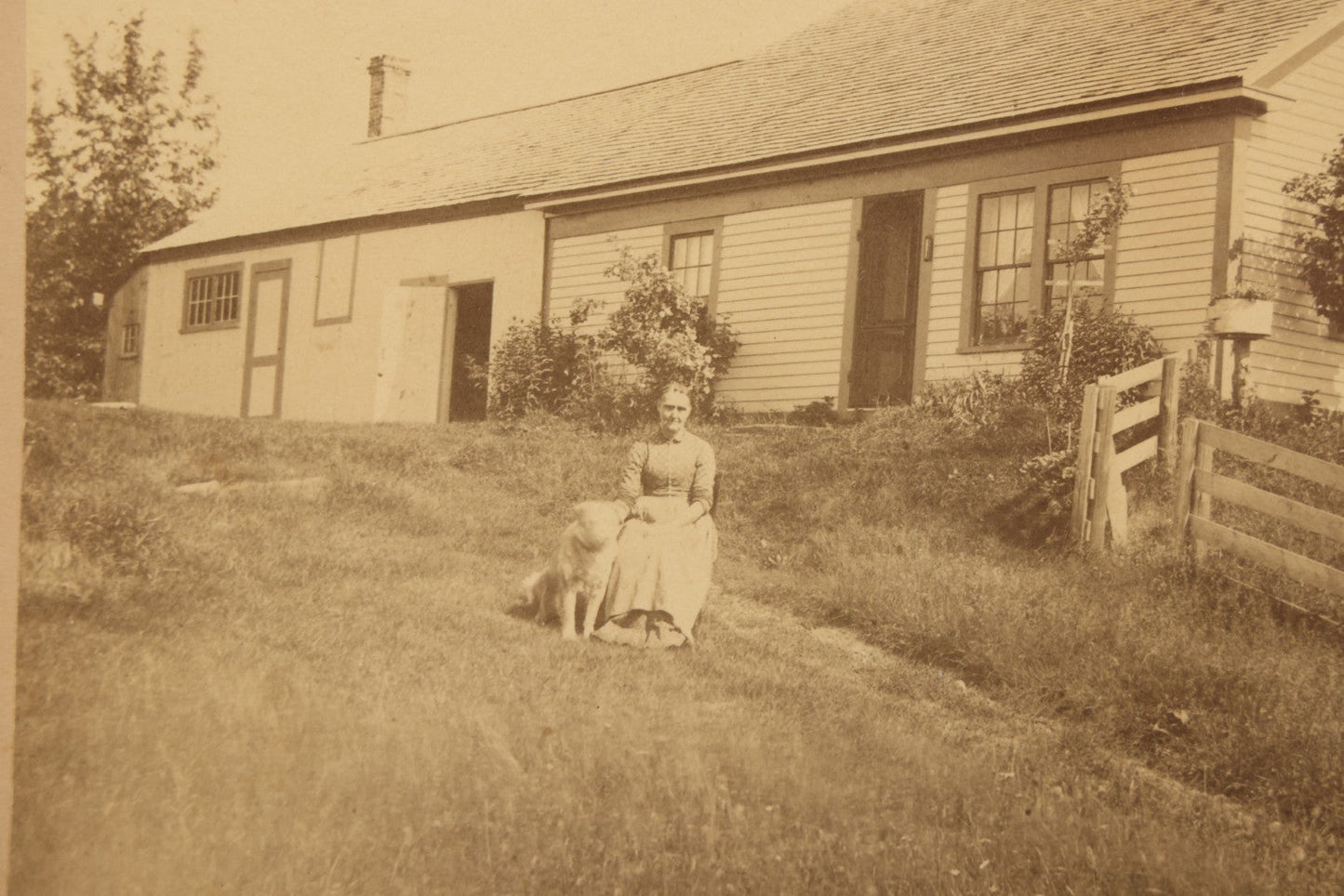 Lot 110 - Antique Boarded Photograph Of Woman Seated With Dog Before Farmhouse And Barn, In Faux Marble Painted Double Frame, 15-5/8" x 13-3/4"