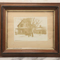 Lot 111 - Antique Boarded Photograph Of Elderly Couple And Older Woman Before New England Connected Farmhouse And Barn In Winter, In Walnut Double Frame, 13-1/4" x 11-3/8"