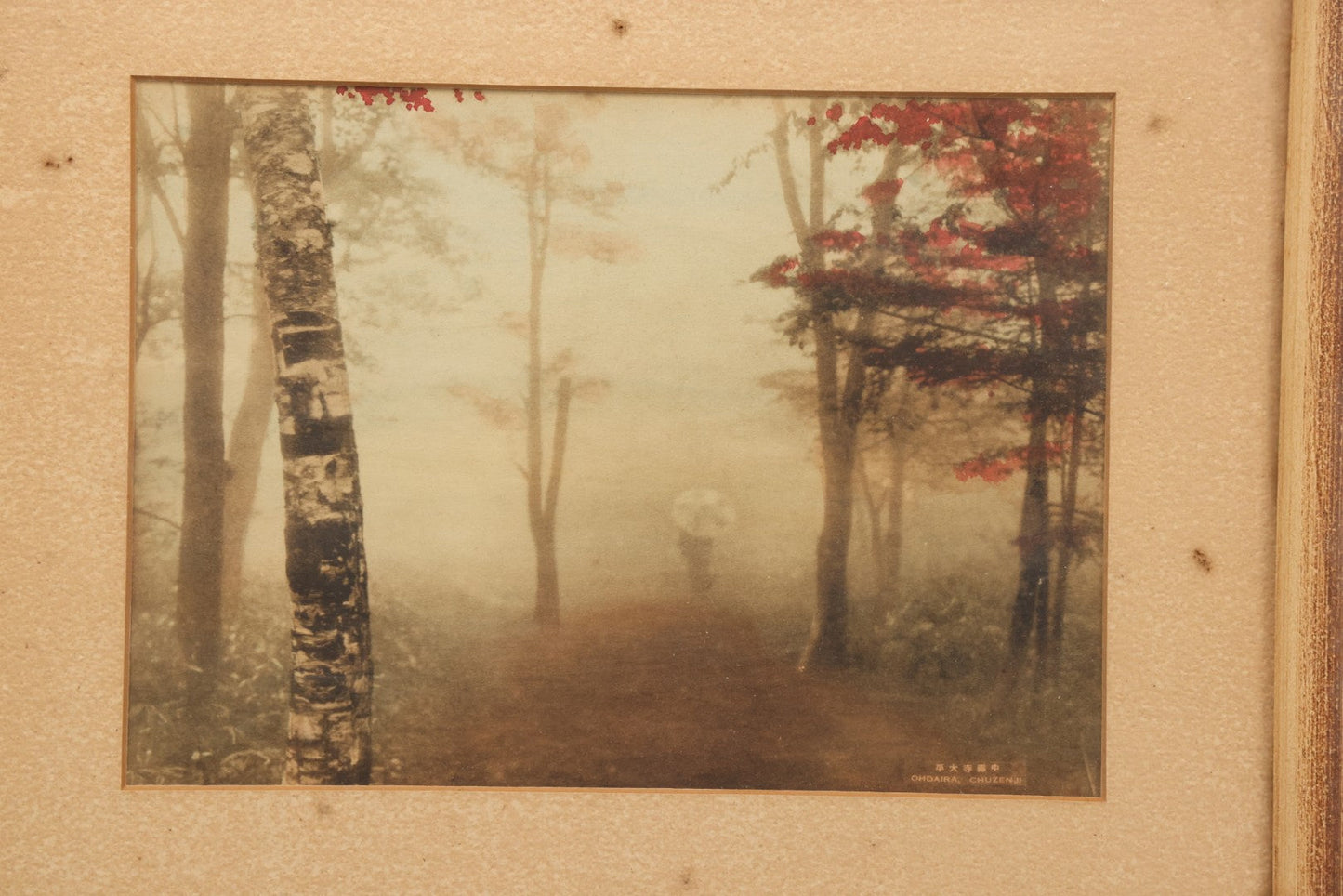 Lot 112 - Antique Hand-Colored Photograph By Ohdaira, Chuzenji, Japan, Landscape With Figure In Fog With Umbrella, 11-5/8" x 9-1/2"