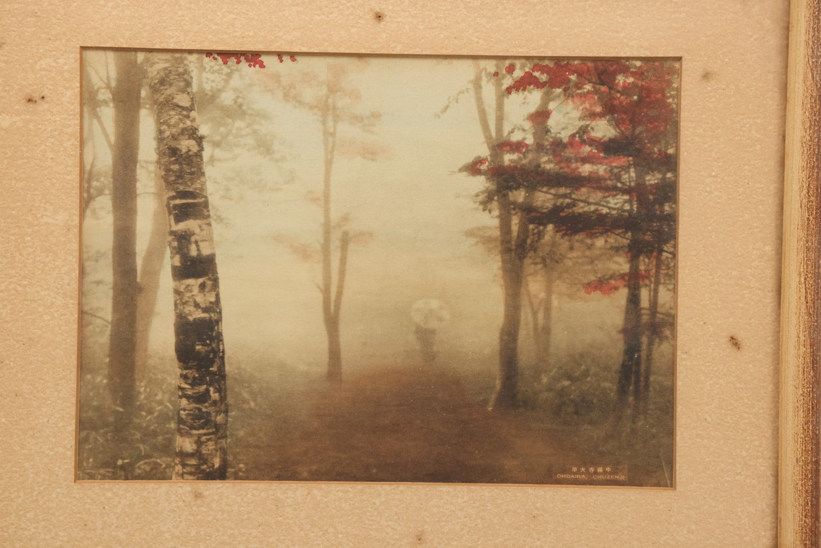 Lot 112 - Antique Hand-Colored Photograph By Ohdaira, Chuzenji, Japan, Landscape With Figure In Fog With Umbrella, 11-5/8" x 9-1/2"