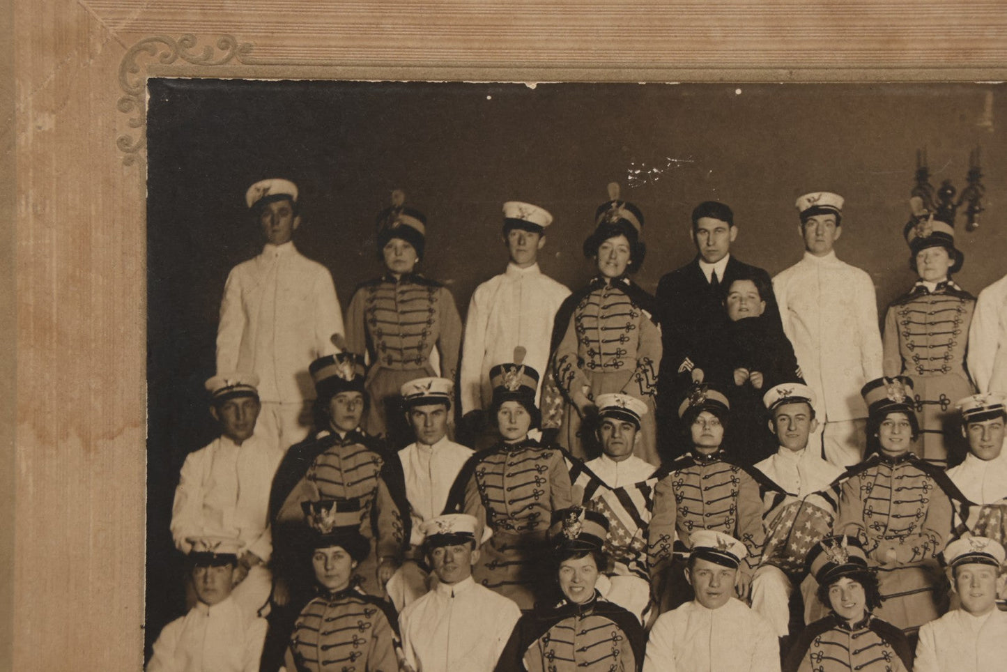 Lot 114 - Antique Boarded Group Photograph Of Men In Sailor Uniforms And Women In Marching Band Outfits