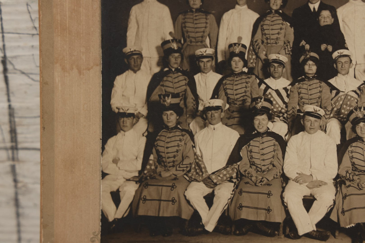 Lot 114 - Antique Boarded Group Photograph Of Men In Sailor Uniforms And Women In Marching Band Outfits