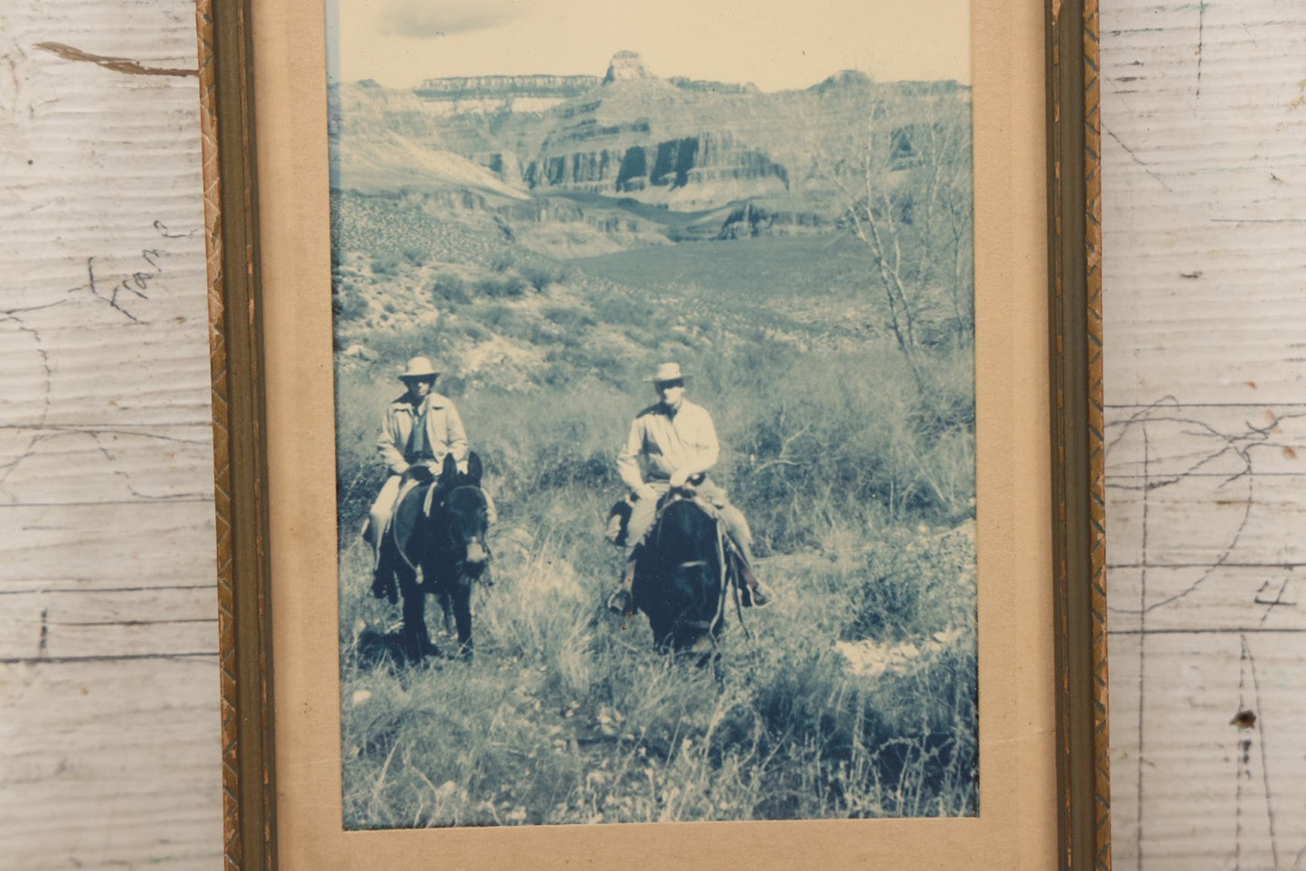 Lot 116 - Vintage Glossy Photograph Of Two Cowboys Riding Through Prairie Under Cloudy Sky, Framed, 6-7/8" x 9-5/8"