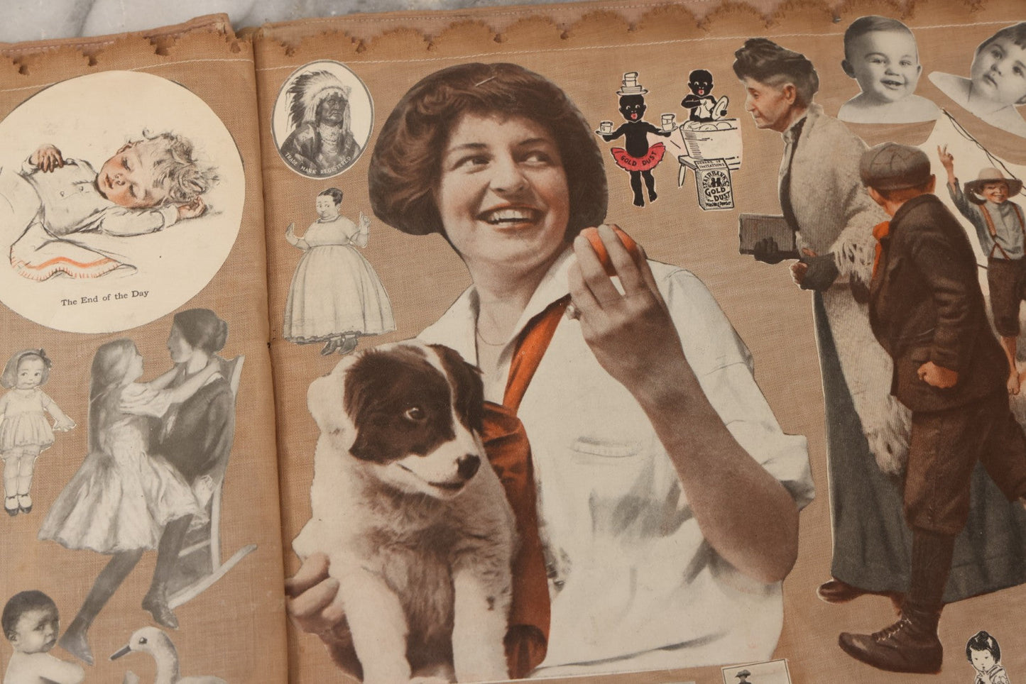 Lot 134 - Antique Linen Scrapbook With Fabric Pages Containing Over 100 Hand Cut Magazine Clippings Including Santa, Children, Animals, Kewpies, Women, Advertisements, And More Circa 1913