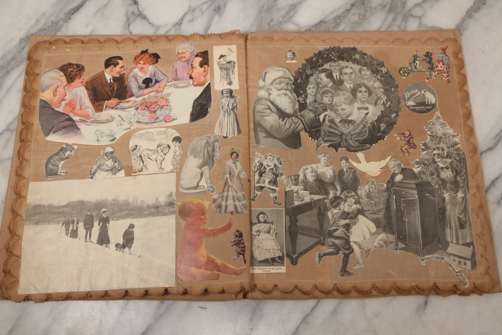 Lot 134 - Antique Linen Scrapbook With Fabric Pages Containing Over 100 Hand Cut Magazine Clippings Including Santa, Children, Animals, Kewpies, Women, Advertisements, And More Circa 1913