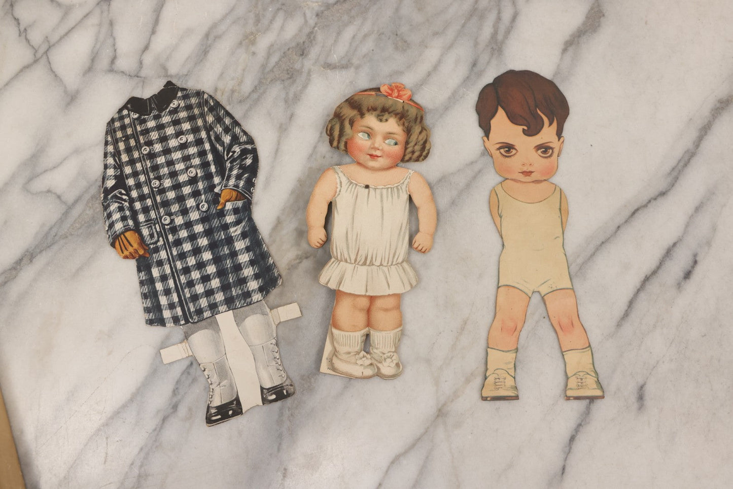 Lot 136 - Antique Box Lot Of Paper Dolls And Clothing, Including Hand Drawn Outfits And Mechanical "Susan" Doll By Sam'L Gabriel Sons & Company, Printed In Germany, 1919