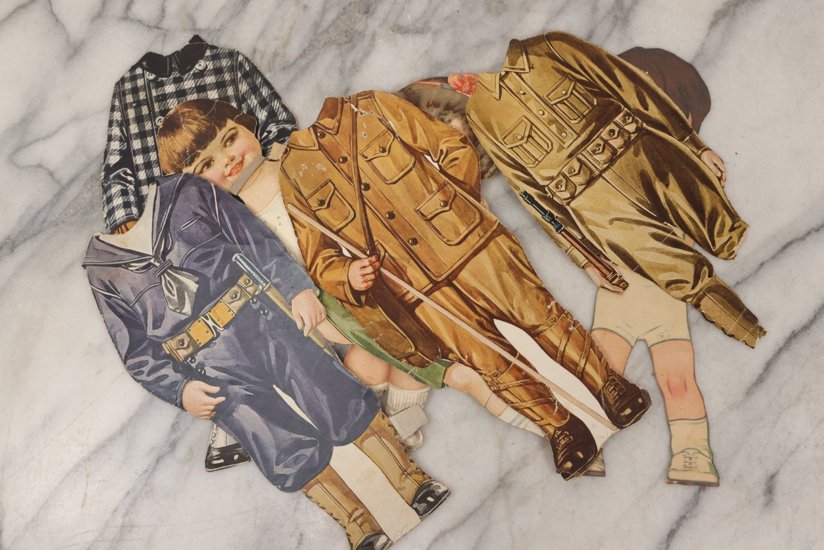 Lot 136 - Antique Box Lot Of Paper Dolls And Clothing, Including Hand Drawn Outfits And Mechanical "Susan" Doll By Sam'L Gabriel Sons & Company, Printed In Germany, 1919