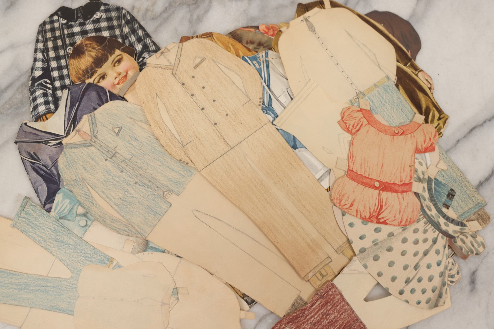 Lot 136 - Antique Box Lot Of Paper Dolls And Clothing, Including Hand Drawn Outfits And Mechanical "Susan" Doll By Sam'L Gabriel Sons & Company, Printed In Germany, 1919