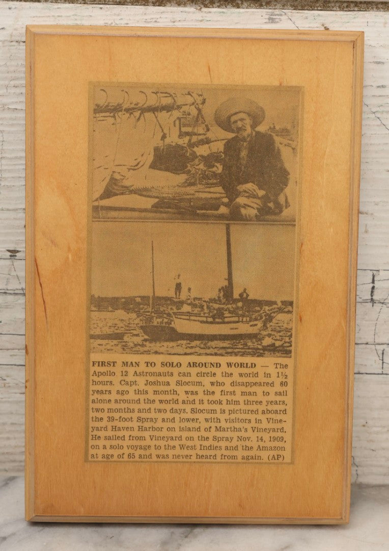 Lot 140 - Vintage Decoupage Plaque Featuring Captain Joshua Slocum Newspaper Clipping, “First Man To Solo Around World,” 5-1/2" x 8-1/4"