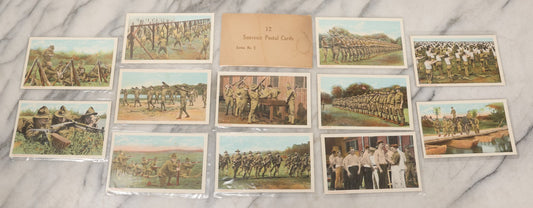 Lot 145 - Grouping Of 12 Antique World War I Soldier Training Postcards With Original Souvenir Folder, Series No. 1, Illustrated Postal Card & Novelty Co., New York