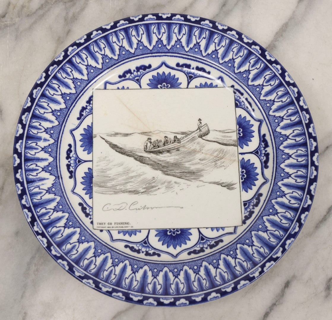 Lot 153 - Pair Of Antique Royal Doulton Decorative Plates With Life Publishing Co. Scenes By Charles Dana Gibson, 1900–1901, Including "They Go Fishing" And "She Goes To The Fancy Dress Ball As 'Juliet'," 10-1/2" Diameter Each